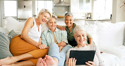 Buy stock photo Home, mature women and laughing with tablet on sofa for comedy series, weekend break or bonding. Friends, happy group or relax with tech in apartment for streaming funny show, holiday reunion or care