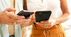 Women, friends and hands with phone or data sync for connectivity, network or sharing app in home. Closeup, female people or users typing with mobile smartphone for communication or connection