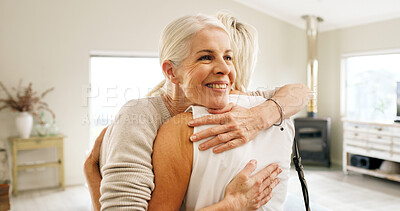 Buy stock photo Friends, hug and smile with old women in home for bonding, good news or retirement. Happiness, love and social reunion with senior people in living room of apartment for embrace, support and care