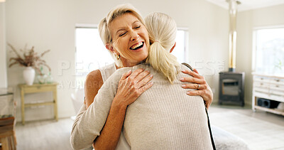 Buy stock photo Friends, hug and support with old women in home for bonding, good news or retirement. Happiness, love and social reunion with senior people in living room of apartment for embrace, smile and care