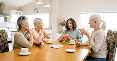 Buy stock photo Cards, friends and senior woman at table for game, weekend reunion and brain exercise for entertainment. Coffee cup, waiting and old people playing together in home, concentration and mental activity