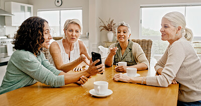Buy stock photo Mature women, friends and phone at house for social media, browsing website and reading gossip. Group, people and mobile for celebrity news, review post and message notification at reunion gathering