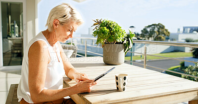 Buy stock photo Balcony, relax and tablet with senior woman at apartment for break, retirement or social media. App, coffee and home with old person outdoor on veranda for fresh air, me time or online planning