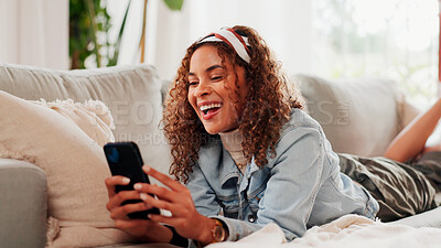 Buy stock photo Woman, laughing and relax on sofa with phone for viral social media meme, text message and joke. Happy, female person and scroll with tech in home for online communication, internet humor and comedy.