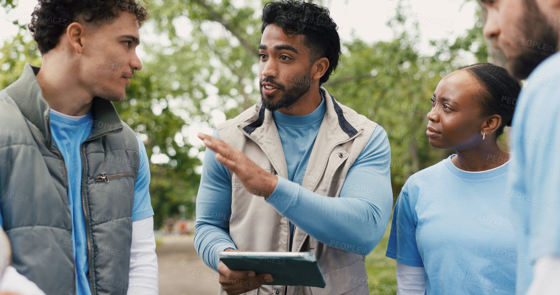Buy stock photo Volunteer, tablet and team outdoor for meeting, planning and community service discussion. Tech, people and group with charity worker at park for coordination, donation project and non profit leader