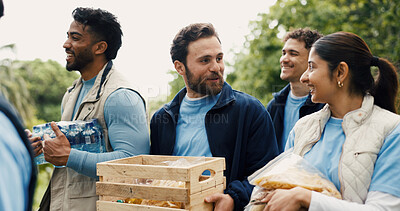 Buy stock photo Donations, volunteering and people with help, outdoor and discussion with community outreach. Charity mission, group or friends in park, NGO project or teamwork with unity, food aid or poverty relief