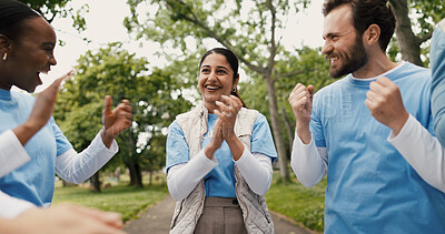 Buy stock photo Excited, volunteers and applause for success, charity and celebration for community service and NGO. Outdoor, happy and people with social responsibility, laugh and clapping for achievement in forest