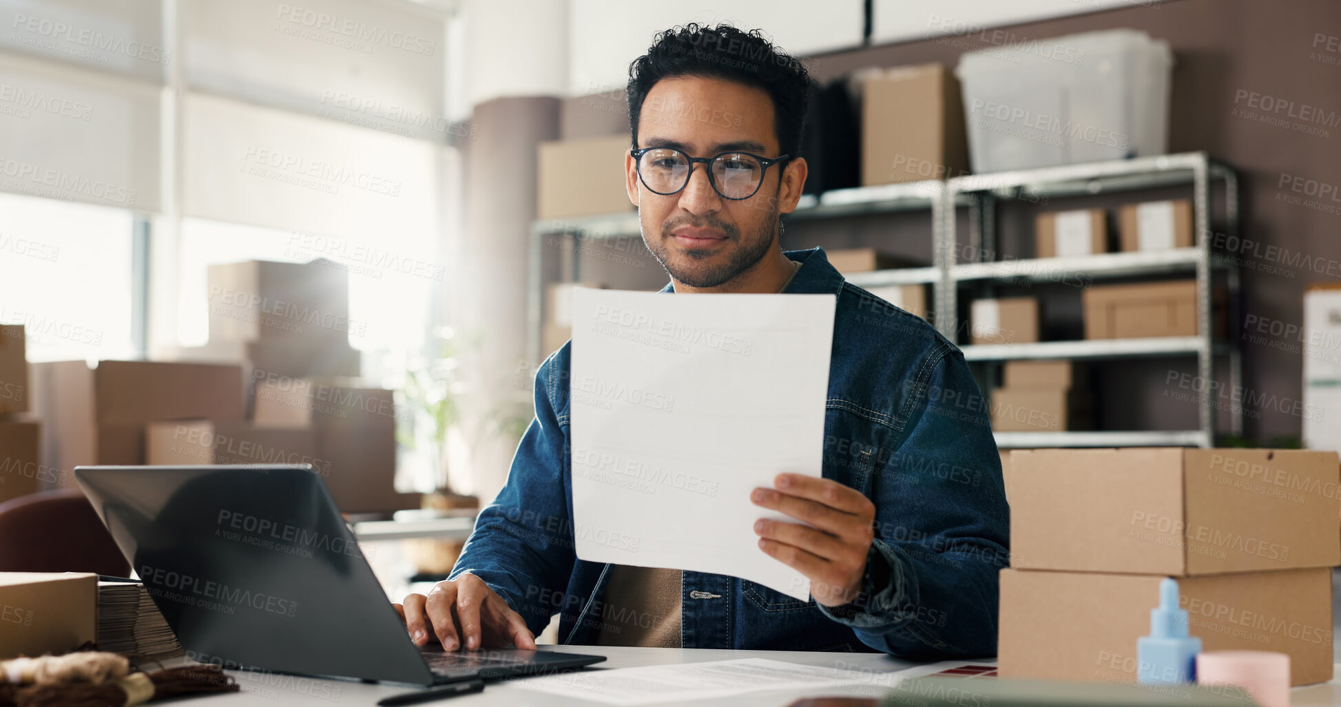 Buy stock photo Man, documents and laptop for dropshipping, logistics or contract for distribution deal in office. Person, paperwork and admin for supply chain, invoice or happy with computer for shipping at startup