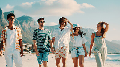 Buy stock photo Happy, friends outdoor and walking on beach for bonding together, summer holiday and travel adventure. People, smile and stroll by ocean for hangout, weekend getaway and tropical vacation activity.