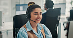 Headset, contact us and happy woman in call center for technical support, help desk or coworking. Smile, hotline and consultant with computer for customer service, IT solution or network connection