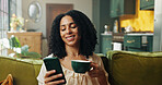 Break, coffee and phone with woman on sofa in living room of home for me time or weekend. App, cup and text message with person drinking beverage in apartment for chilling, easy morning or relax