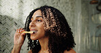 Dental hygiene, bamboo and woman brushing teeth in home for gum care, fresh breath and eco friendly. Toothbrush, clean and African person in bathroom for gingivitis prevention or sustainable wellness