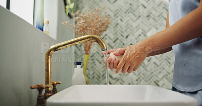 Buy stock photo Water, soap and woman washing hands in bathroom for removal of germs, dirt or bacteria. Sink, hygiene and female person with cleaning skin for health, wellness or virus safety routine in home.