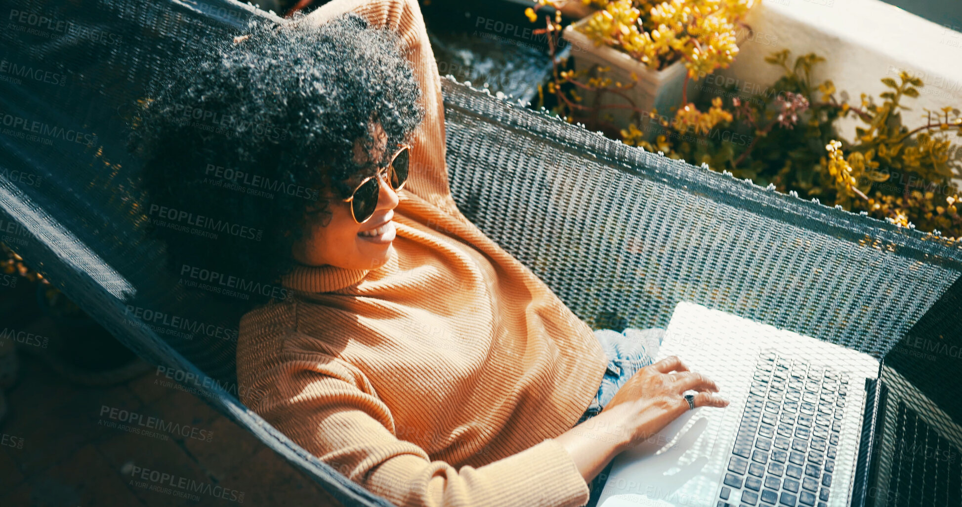 Buy stock photo Outdoor, relax or woman on hammock with laptop, browsing internet forum or streaming film on balcony. Sunglasses, computer screen and person at home to watch movie, reading blog post and social media