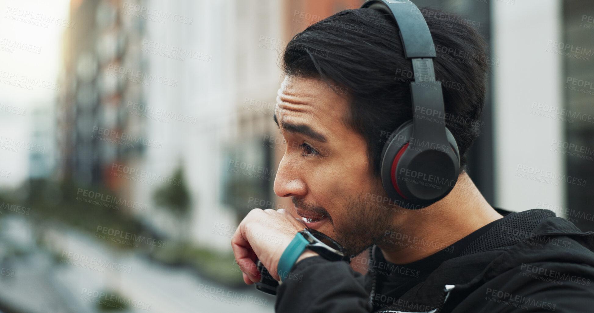 Buy stock photo Thinking, athlete and man with headphones outdoor for fitness, streaming podcast and exercise. Thoughts, male person and smart watch for training, listening to music and reflection for wellness goals