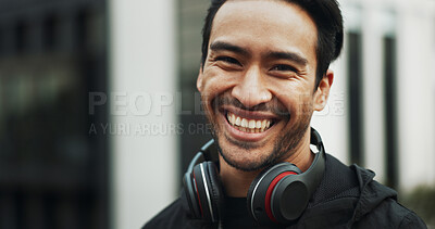 Buy stock photo Fitness portrait, man and smile in city for exercise break, wellness progress and cardio training. Space, happy athlete and headphones outdoor for workout rest, running practice and pace improvement