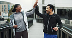 Runner, people and high five with smile in city for fitness progress, race training or teamwork. Interracial couple, achievement or celebration for workout results, cardio pace and exercise goal