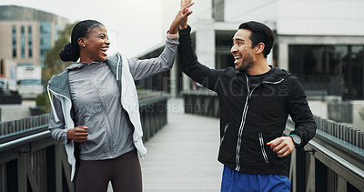 Buy stock photo Runner, people and high five with smile in city for fitness progress, race training or teamwork. Interracial couple, achievement or celebration for workout results, cardio pace and exercise goal