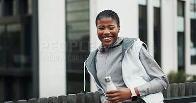 Buy stock photo Happy, portrait and black woman with water for fitness, exercise or workout break in city. Female person, runner or rest with smile, mineral liquid or beverage for recovery or hydration in urban town