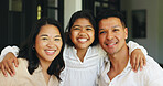 Portrait, smile and parents with daughter in home for bonding, happy family and support for connection. Happiness, trust and people with child in apartment, security and care from loving relationship