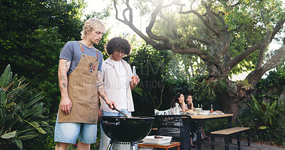 Buy stock photo Help, barbecue and cooking with men outdoor for celebration, summer vacation and lunch. Weekend break, social reunion with group of friends in nature for bbq cookout, food and party event together