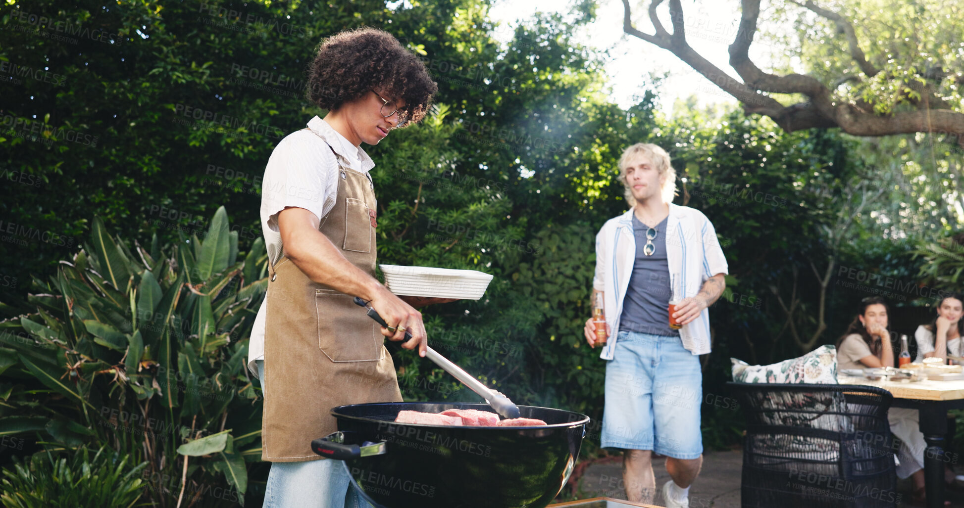 Buy stock photo Meat, barbecue and cooking with man outdoor for celebration, summer vacation and lunch. Weekend break, reunion with group of friends in nature for bbq cookout, food and party event