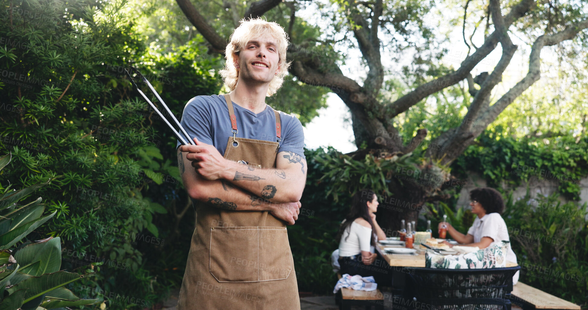 Buy stock photo Barbecue, lunch and portrait of man outdoor for cooking, social reunion and celebration event. Party, bbq grill and summer vacation with people in nature for cookout, weekend and holiday together