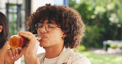 Buy stock photo Man, drinking beer or relax in home with friends for summer holiday, weekend hangout or social gathering. Bokeh, person or alcohol beverage with glass bottle in house for refreshment, party or space.