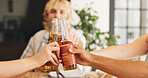Cheers, hands and beer with friends outdoor for weekend break, support and bonding. Congratulations, party event and toast with group of people and alcohol drink in backyard of home for lunch