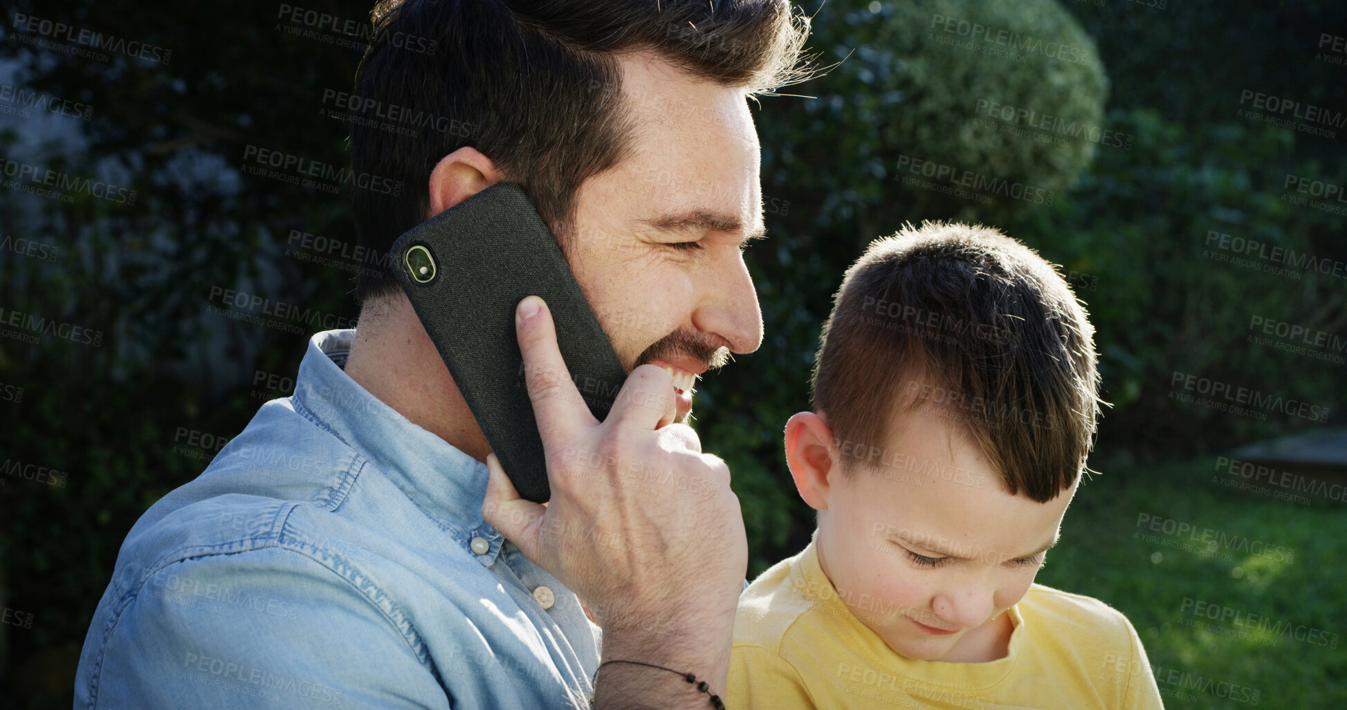 Buy stock photo Happy father, kid and talk with phone call, child care plan and back to school discussion in backyard. Dad, son and smile outdoor with technology, contact or conversation for kindergarten education.