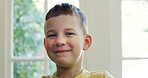 Smile, growth and portrait with boy in home for child development, weekend break and relax. Happiness, peace and childhood with male kid in living room of apartment for humor, calm and wellness