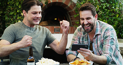 Buy stock photo People, friends and cheering with phone in backyard for sports game, streaming and football goal. Men, mobile and fist pump for contest victory, world cup and team celebration for soccer achievement