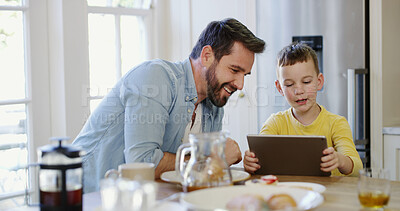 Buy stock photo Tablet, child and father in home with smile for app, bonding together and watch show with family. Boy, dad and tech in house for website, online movie or streaming cartoon with parent at breakfast