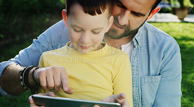 Buy stock photo Tablet, father and child outdoor for game, bonding together and pointing at app for movie choice. Boy, dad and technology in nature for website, online film or watch series with parent on internet