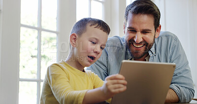 Buy stock photo Tablet, kid and dad in home with smile for app, bonding together or play educational game. Boy, father and technology in family house to show website, online learning or relax with parent on internet