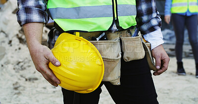 Buy stock photo Construction, outdoor and hands of person with helmet for infrastructure, building project and safety. Civil engineering, closeup and contractor with ppe for protection, architecture and renovation
