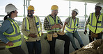Construction site, break and people with discussion, architecture and maintenance with real estate. Group, teamwork and men with women, safety and relax with discussion, engineering and renovation