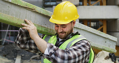 Buy stock photo Carry, construction worker and happy with beam on site for building framework, production or labor. Builder, man or smile with wood material for property expansion, scaffolding or maintenance project