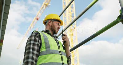 Buy stock photo Radio, man and construction worker on site for infrastructure, building or project management. Discussion, safety gear and male civil engineer with tech for maintenance, inspection or repairs.