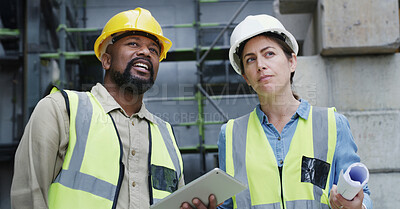 Buy stock photo Woman, man and tablet with planning at construction site, helmet or discussion for property expansion. People, architect and inspection for building project, app and blueprint for real estate in city