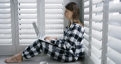 Buy stock photo Laptop, typing and woman in bedroom in home for freelance creative career with remote work. Research, pajamas and female copywriter with computer for article with publishing project in apartment.