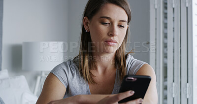 Buy stock photo Woman, phone and sad in bedroom with texting, notification and online dating chat at apartment. Person with depression, smartphone and bad news on mobile app, contact or post on social media in home