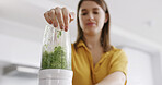 Hand, woman and blender in home for breakfast drink, healthy diet and fruit smoothie. Person, appliance and technology in kitchen to prepare ingredients, meal prep or nutrition shake for weigh loss