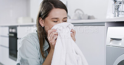 Buy stock photo Home, smelling and woman with clean laundry, fresh fabric and fragrance with soft material. Apartment, chores and happy person with housekeeping service, maintenance and washing with linen textile