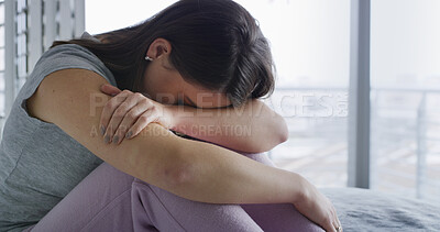 Buy stock photo Sad, woman and stress on bed in home with emotional burnout, relationship mistake and mental health. Regret, person with depression and unhappy in bedroom with overthinking, broken heart and insomnia