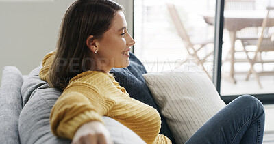 Buy stock photo Woman, relax and thinking on sofa with smile, contemplation and remember good memory in living room. Happy, female person and chill in home with reflection, daydream and positive thoughts on weekend.