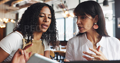 Buy stock photo Cafe owner, woman and meeting with tech for online inventory checklist, staff schedule or review supplier info. People, boss and waitress on tablet for menu plan, laptop and coffee shop budget chat