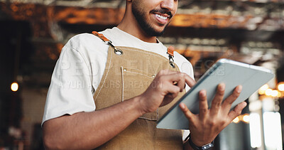 Buy stock photo Restaurant, hands or waiter reading with tablet, table management or browsing online service platform. Check reservation, view menu update or man with tech from low angle, scroll app or order status 