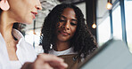 People, waitress and meeting in cafe with tablet for digital menu development, planning or conversation. Women, manager and employee in coffee shop with tech, research and discussion for hospitality.