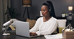 Typing, podcast and laptop with black woman in home for subscription, social media and brand endorsement. Content creation, microphone and broadcast editing with person in apartment for show research